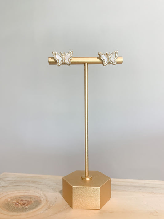 Butterfly shaped gold filled stud earrings adorned with cubic zirconia.