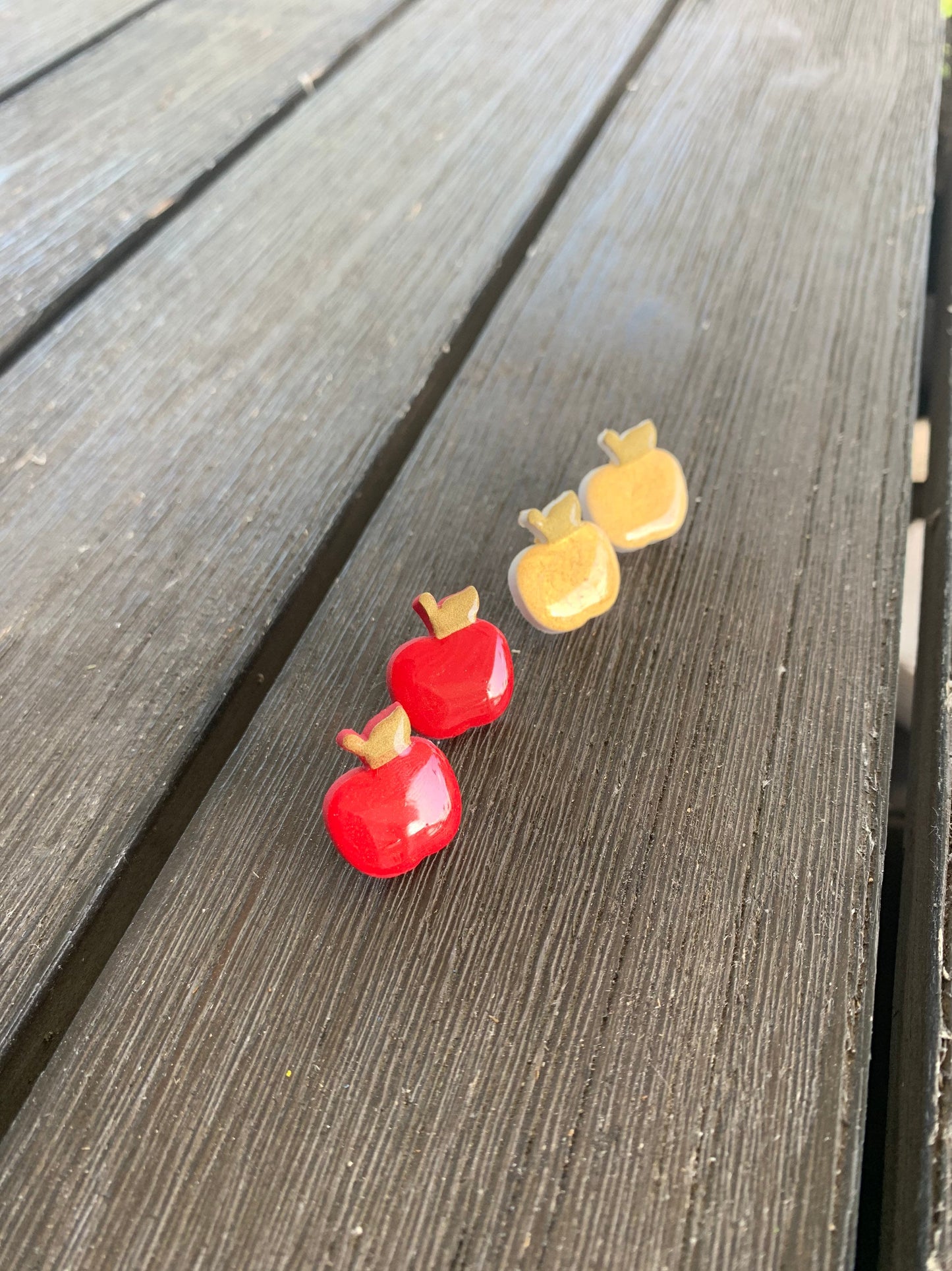 Handcrafted polymer clay earrings coated in resin with intricate design and 18k gold plated earring posts