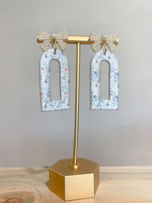 Handcrafted polymer clay earrings adorned with mini pearls and 18k gold plated earring posts