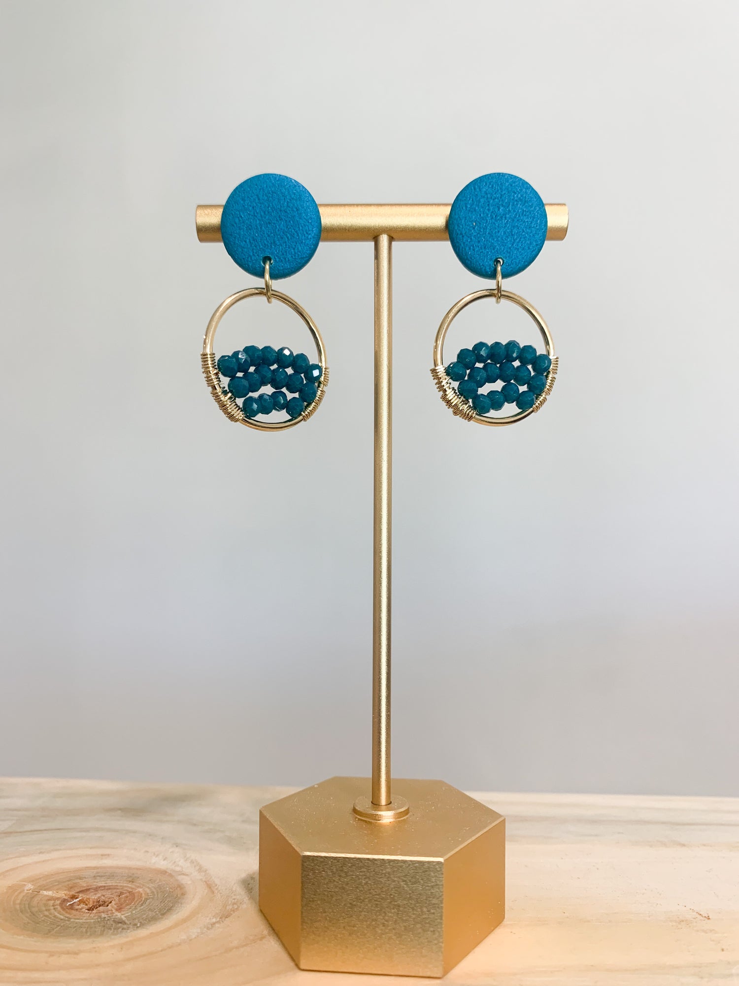 Handcrafted polymer clay earrings with intricate design and 18k gold plated earring posts