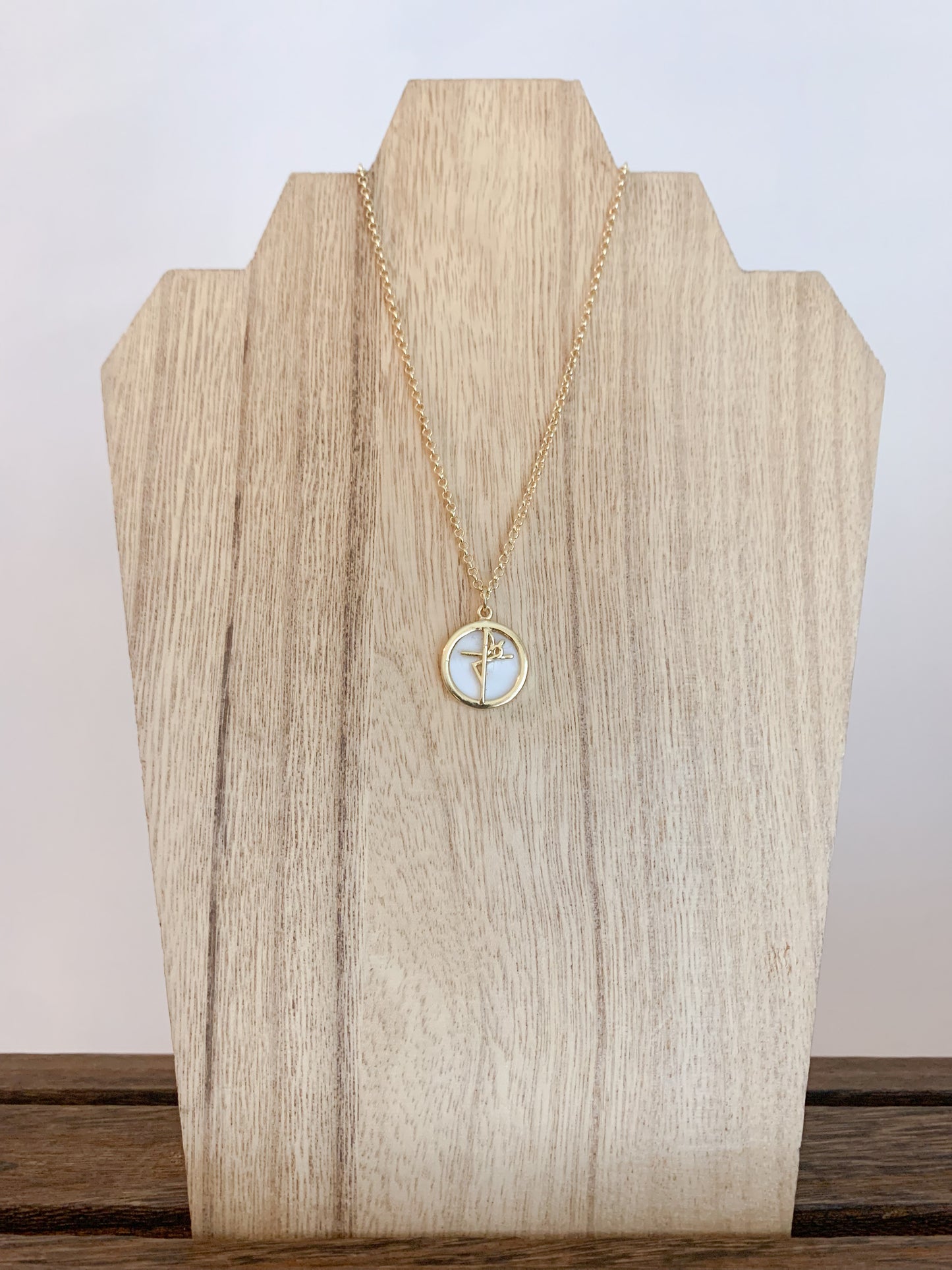 18k gold plated necklace adorned with an enamel pendant with the Sign of Faith