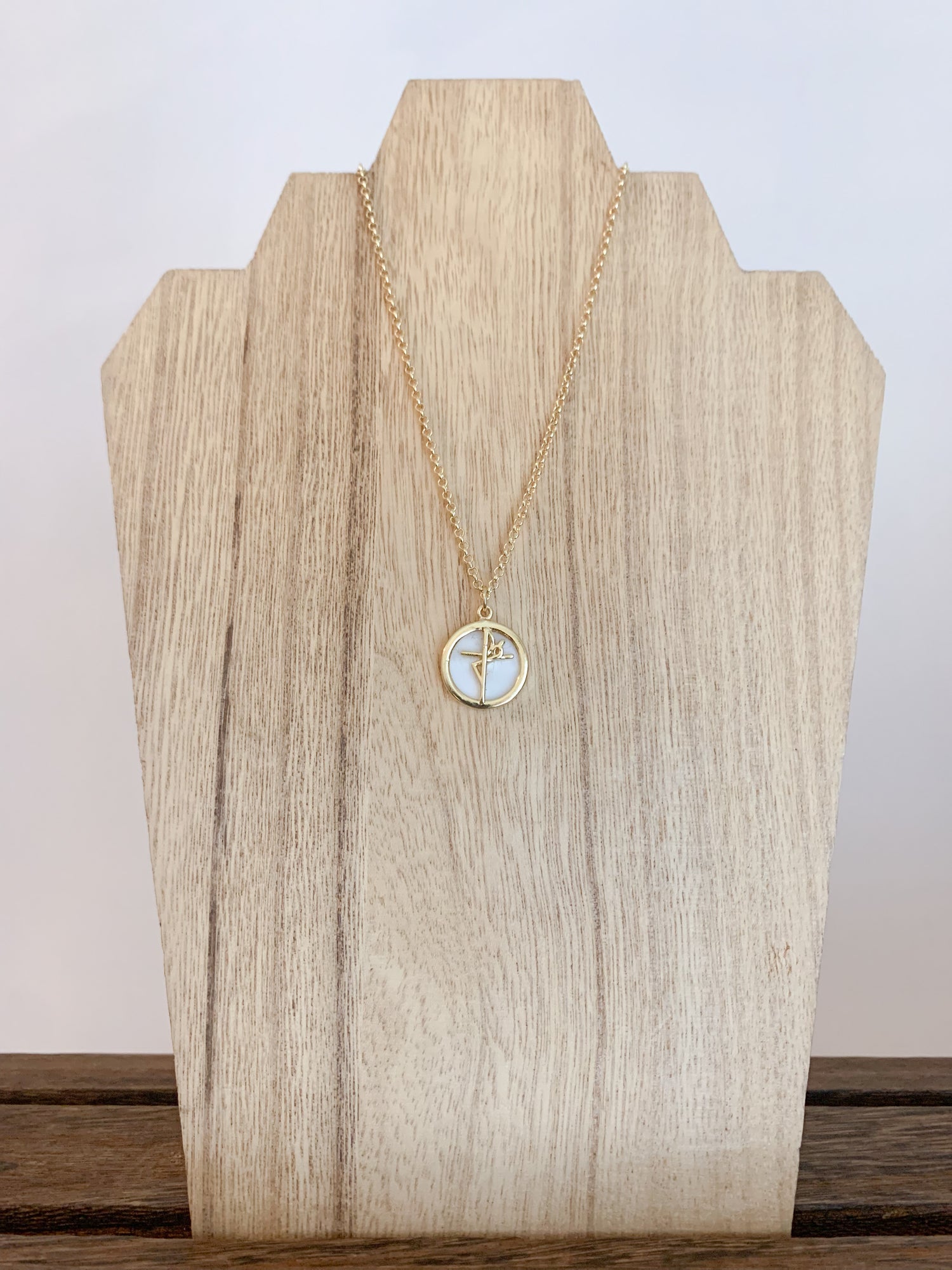 18k gold plated necklace adorned with an enamel pendant with the Sign of Faith