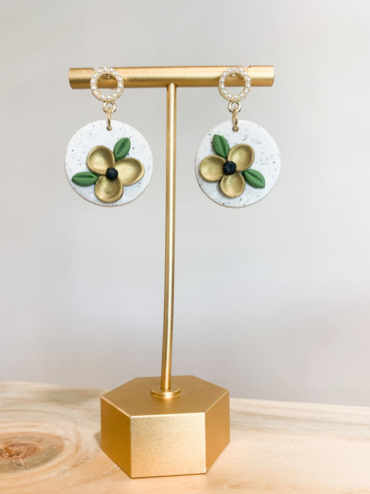 Handcrafted polymer clay earrings with intricate design and 18k gold plated earring posts