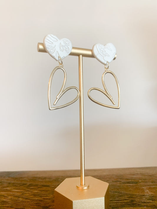 Handcrafted polymer clay earrings with intricate design and 18k gold plated earring posts