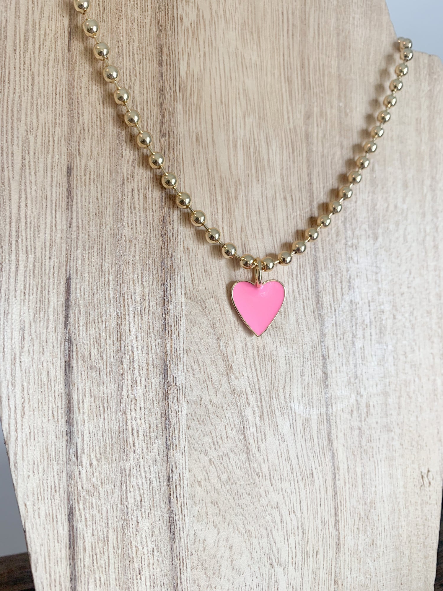 18 Karat Gold Plated Beaded Necklace with Enamel Heart Pendant on a 18 inch adjustable chain.
