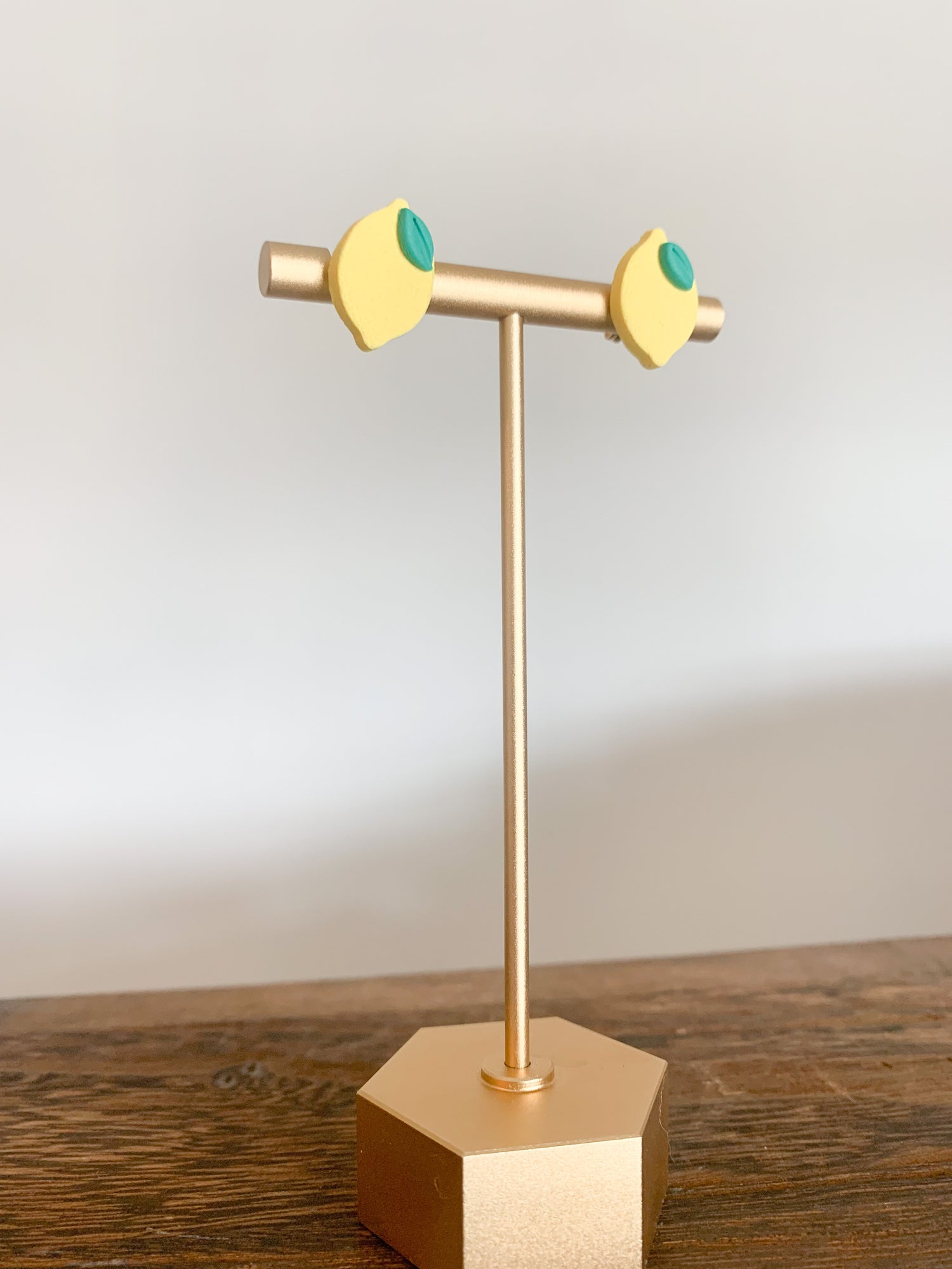 Handcrafted polymer clay earrings with intricate design and 18k gold plated earring posts