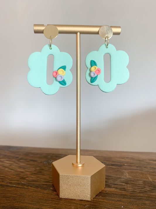 Handcrafted polymer clay earrings with intricate design and 18k gold plated earring posts