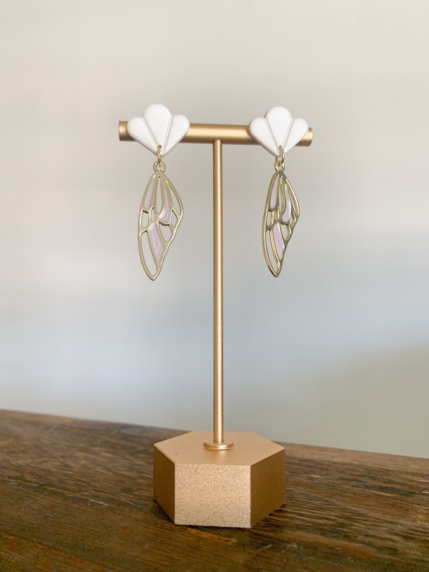 Handcrafted polymer clay earrings with intricate design and 18k gold plated earring posts