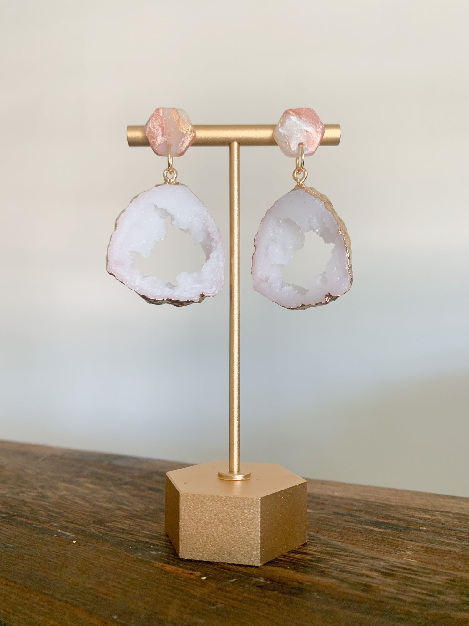 Handmade polymer clay earrings with a large druzy resin charm