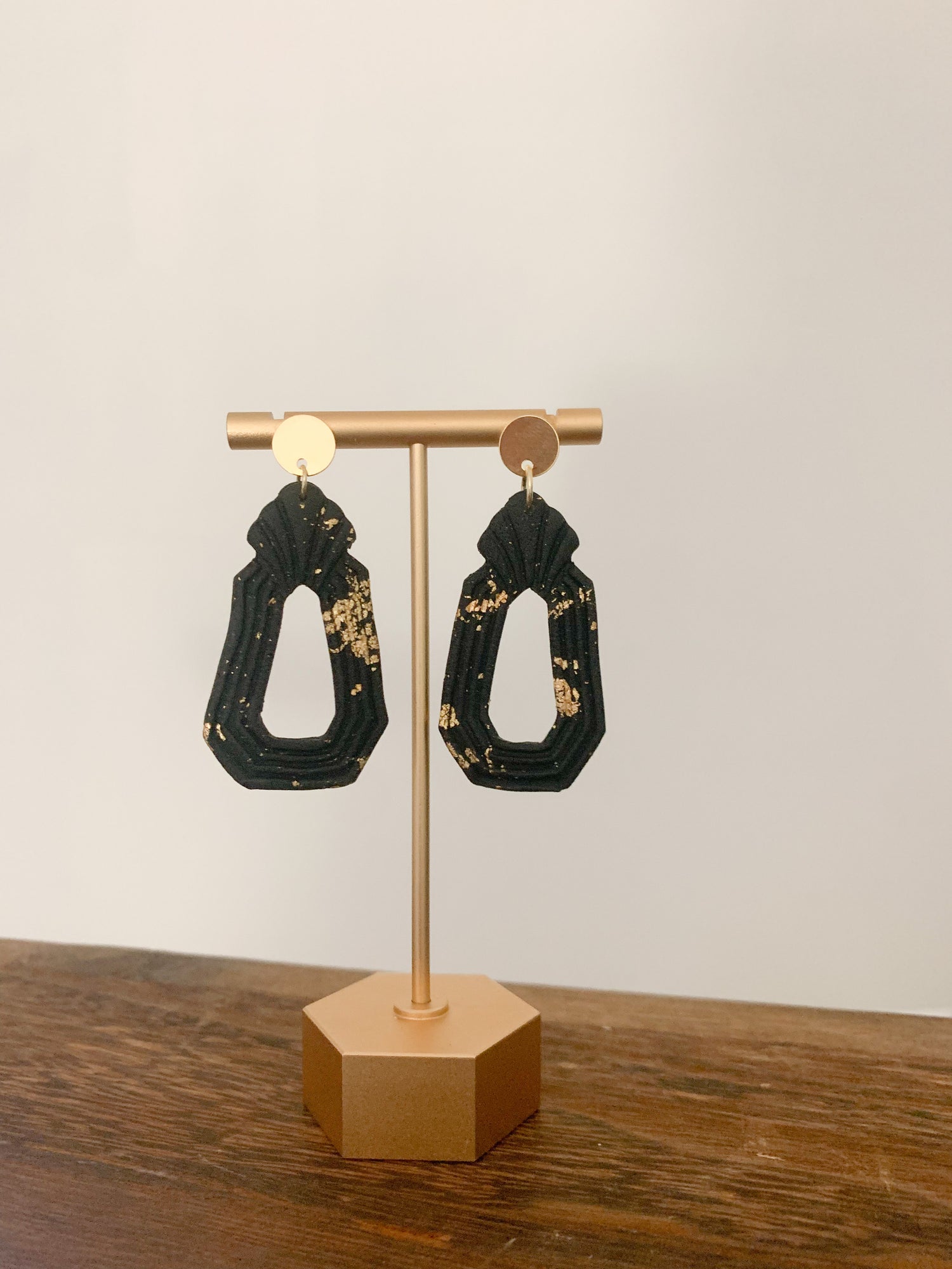 Handcrafted polymer clay earrings with intricate design and 18k gold plated earring posts