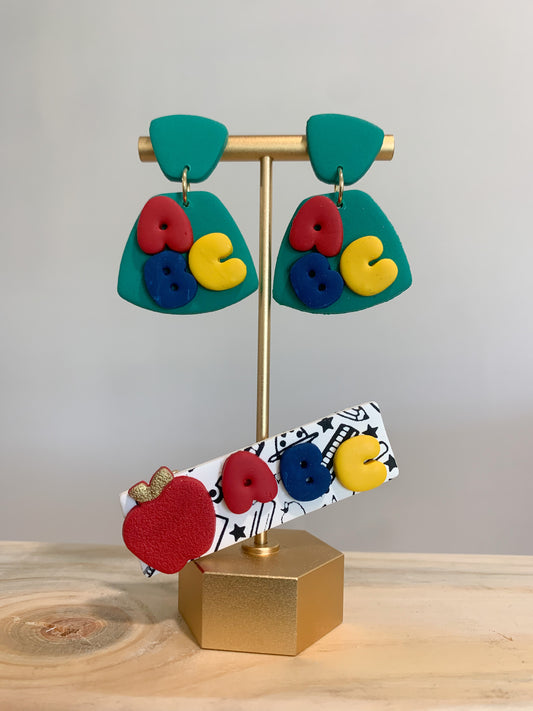 Collection of polymer clay earrings with 18k gold plated earring posts in a range of colors