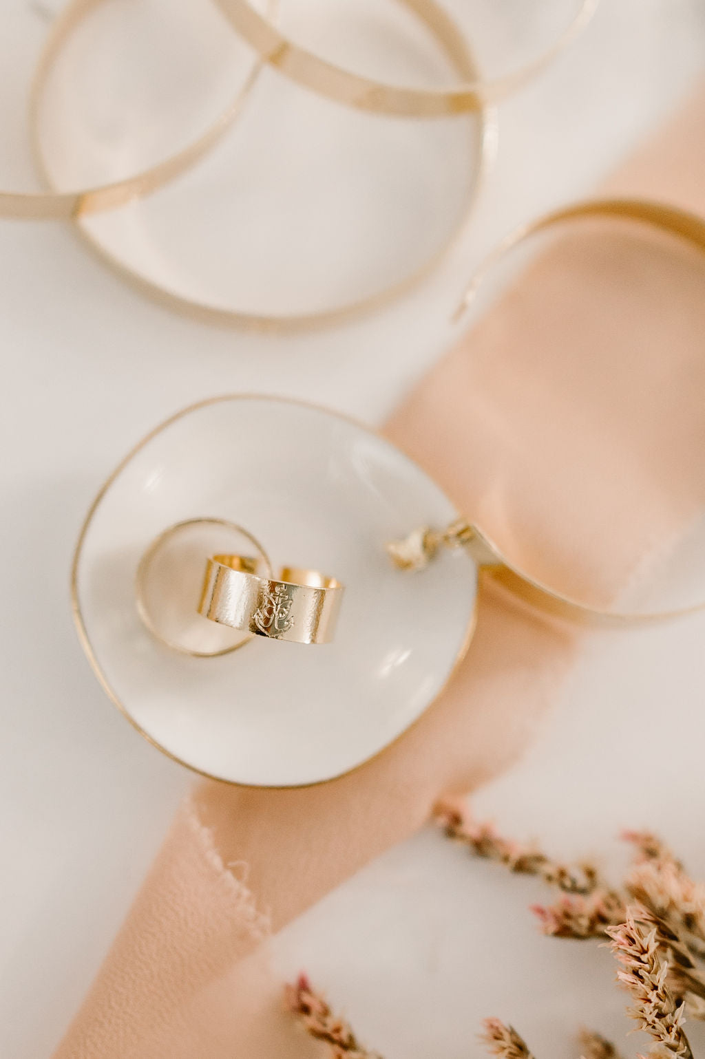 A close up of a gold filled adjustable ring 