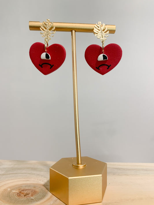 Handcrafted polymer clay earrings with intricate design and 18k gold plated earring posts