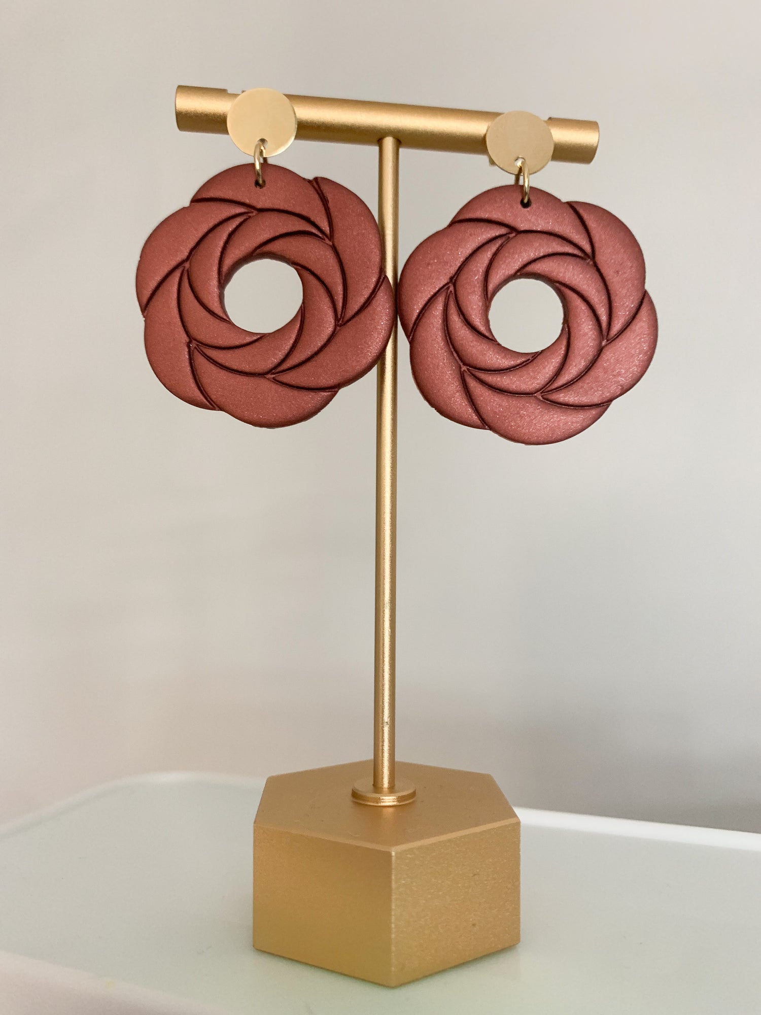 Handcrafted polymer clay earrings with intricate design and 18k gold plated earring posts
