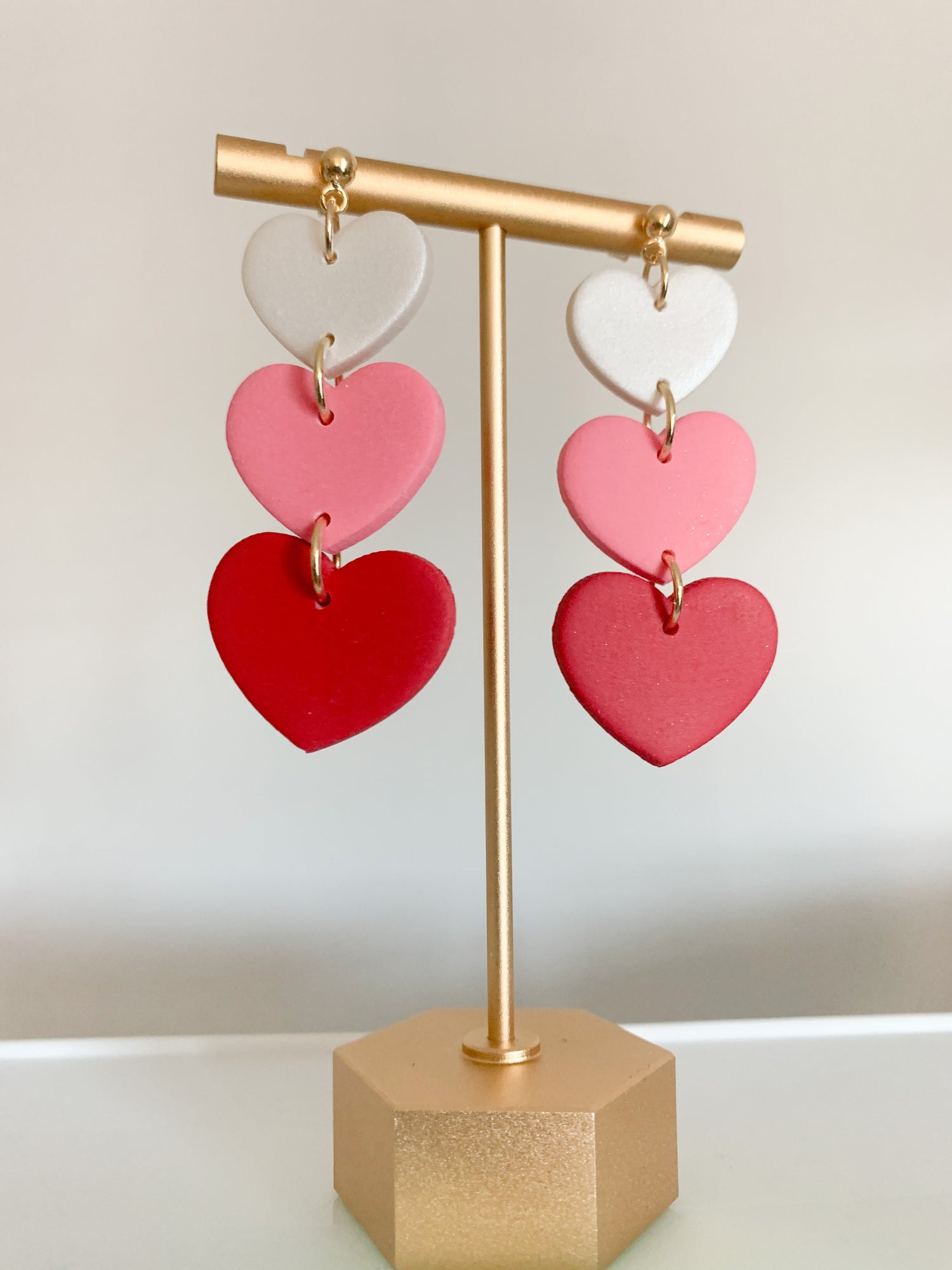 Handcrafted polymer clay earrings with intricate design and 18k gold plated earring posts