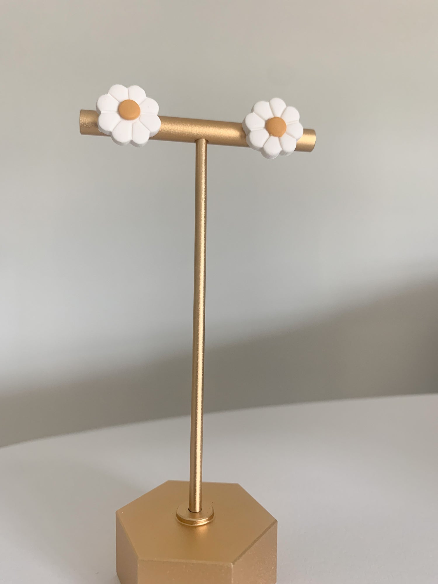 Handcrafted polymer clay earrings with intricate design and 18k gold plated earring posts