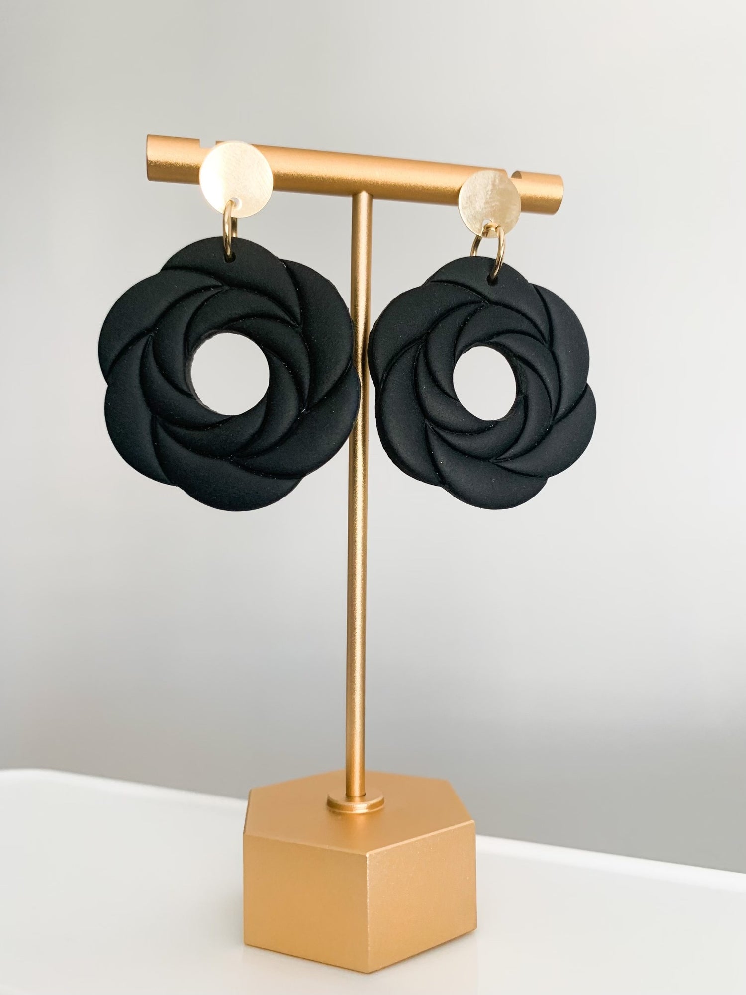 Handcrafted polymer clay earrings with intricate design and 18k gold plated earring posts