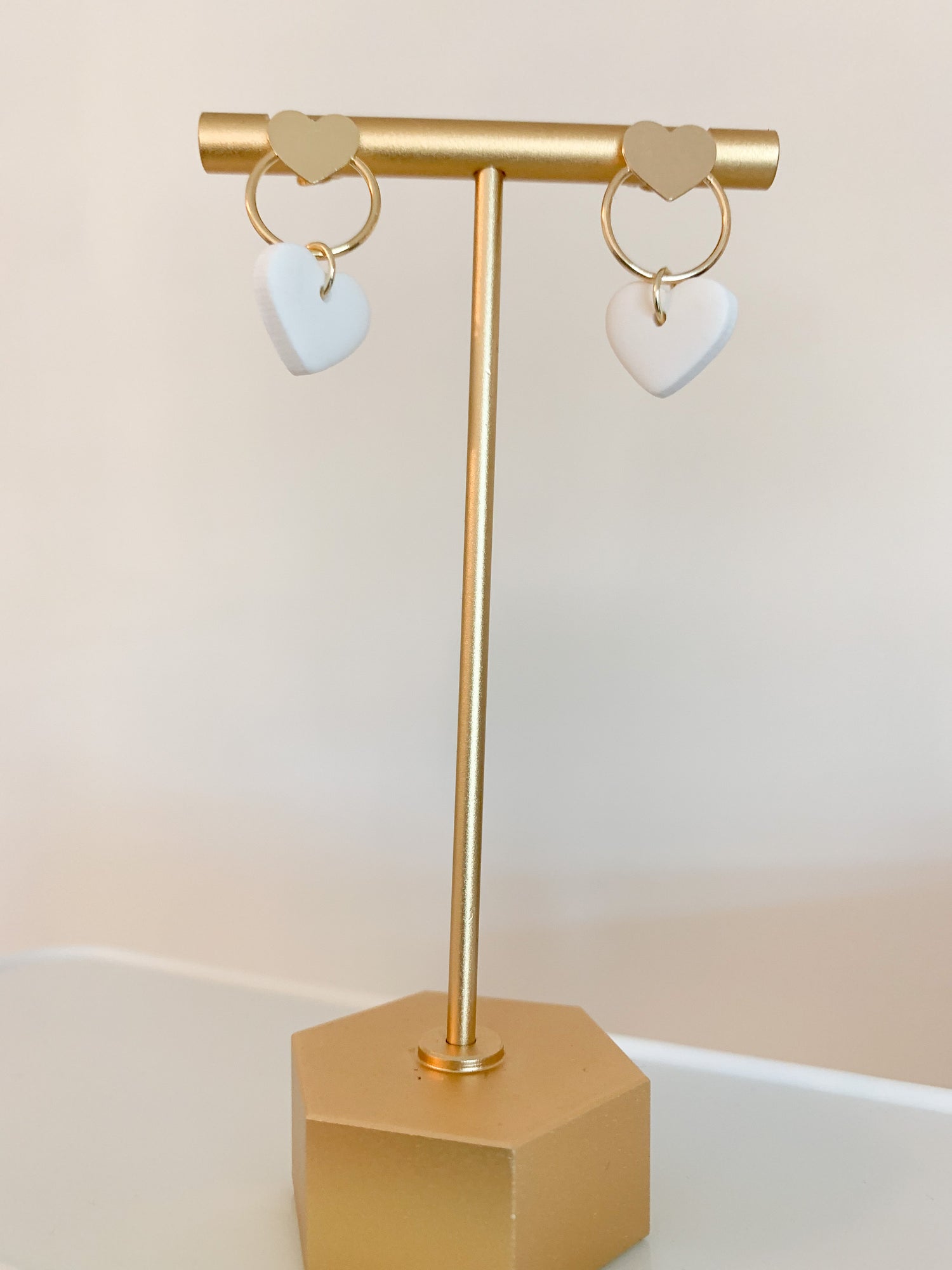 Handcrafted polymer clay earrings with intricate design and 18k gold plated earring posts