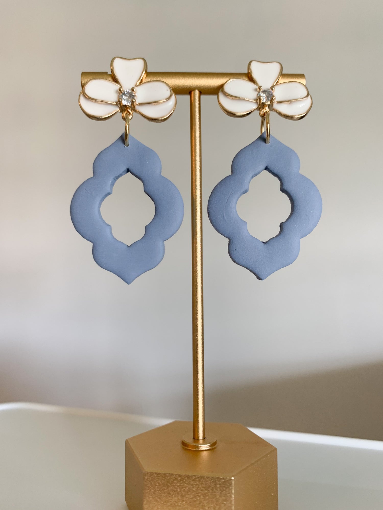 Handcrafted polymer clay earrings with intricate design and 18k gold plated earring posts