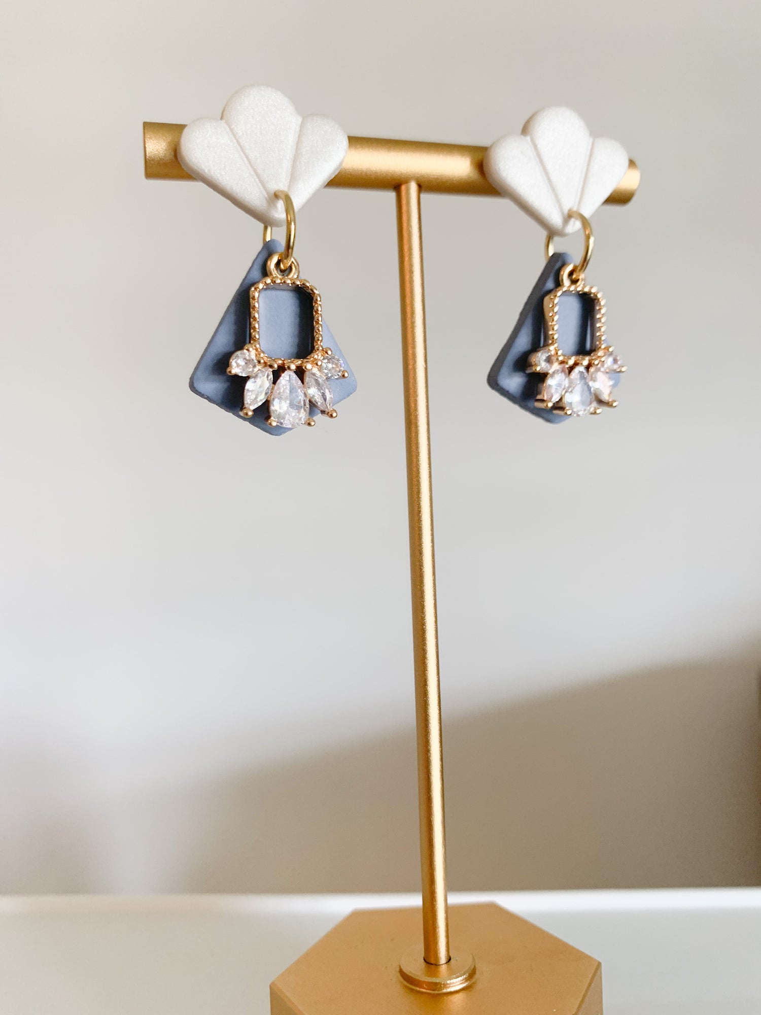 Handcrafted polymer clay earrings with intricate design and 18k gold plated earring posts