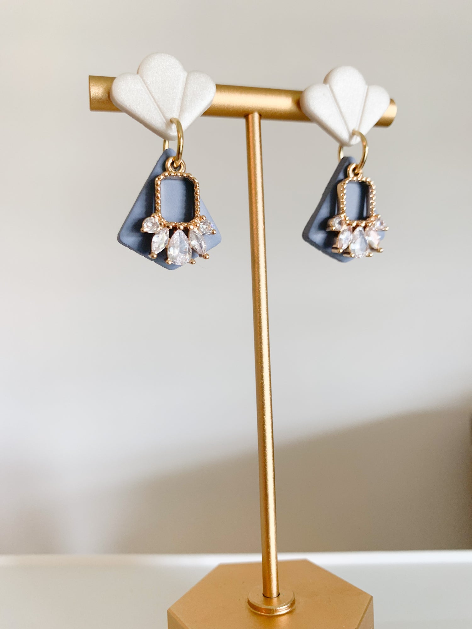 Handcrafted polymer clay earrings with intricate design and 18k gold plated earring posts