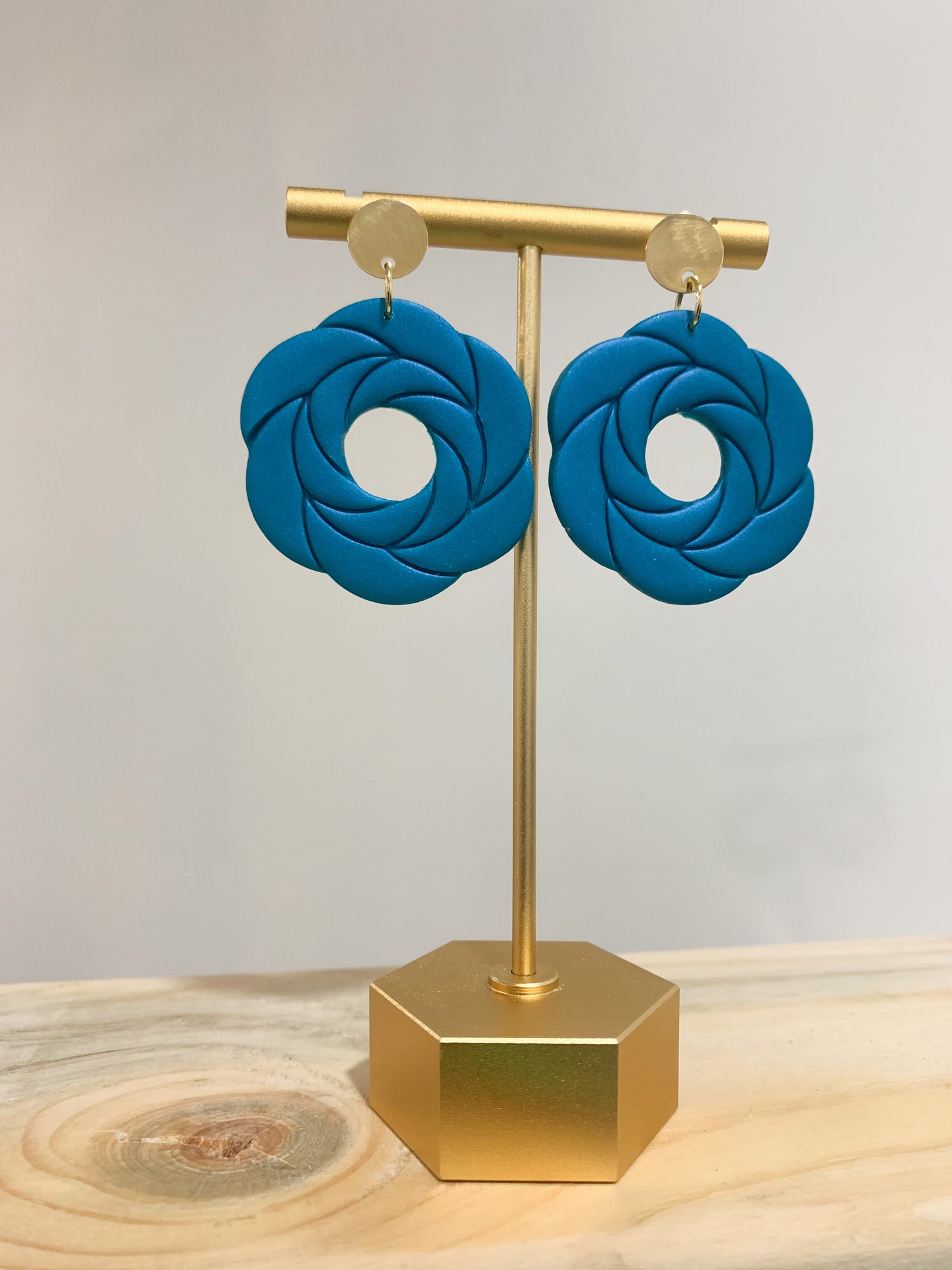 Handcrafted polymer clay earrings with intricate design and 18k gold plated earring posts
