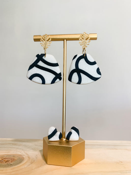 Handcrafted polymer clay earrings with intricate design and 18k gold plated earring posts