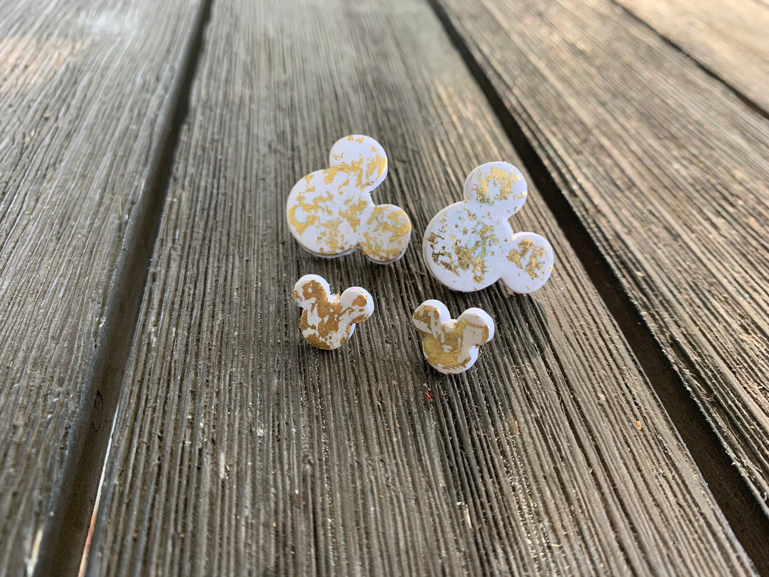 Handcrafted polymer clay earrings with intricate design and 18k gold plated earring posts