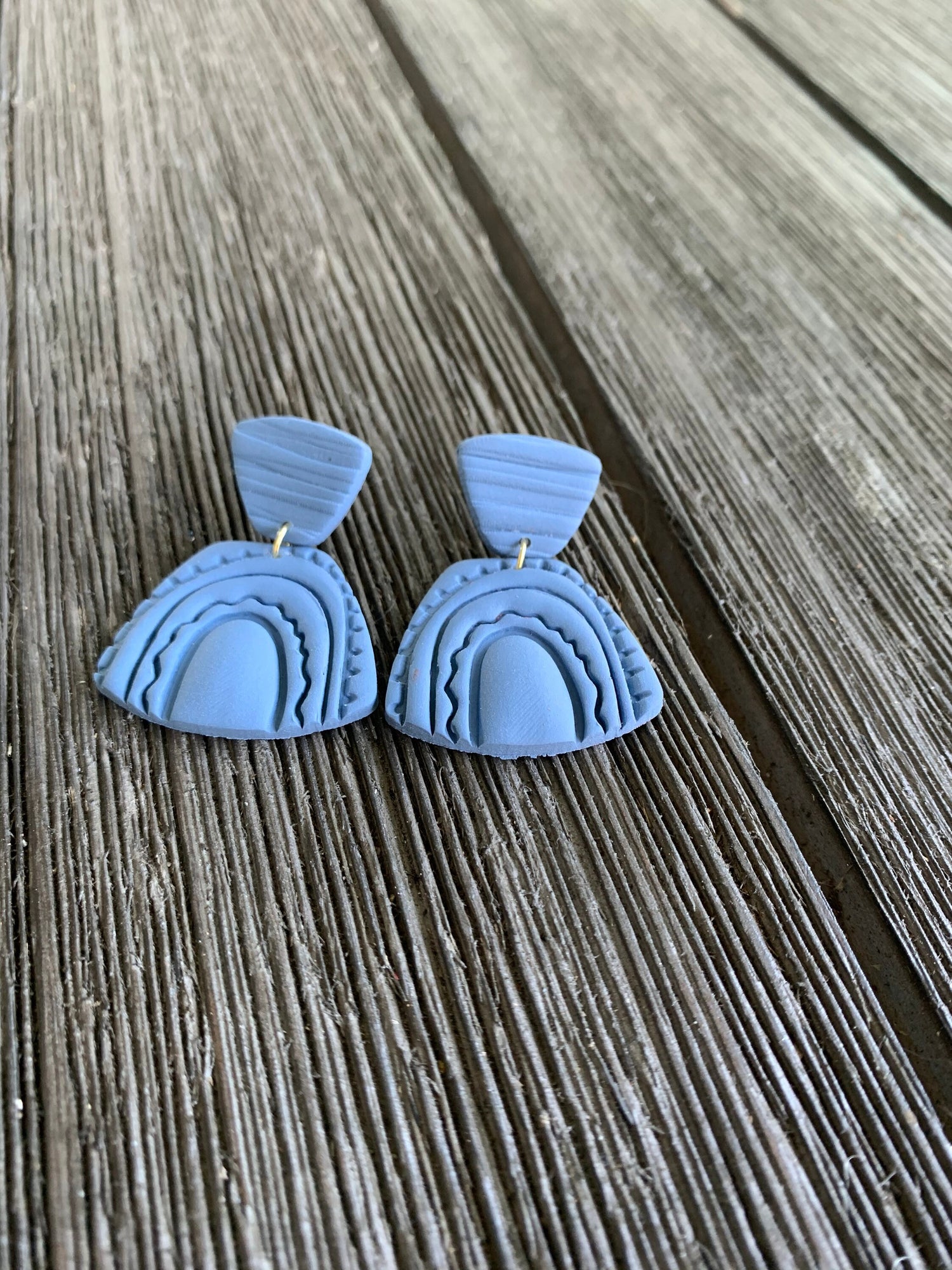 Handcrafted polymer clay earrings with intricate design and 18k gold plated earring posts