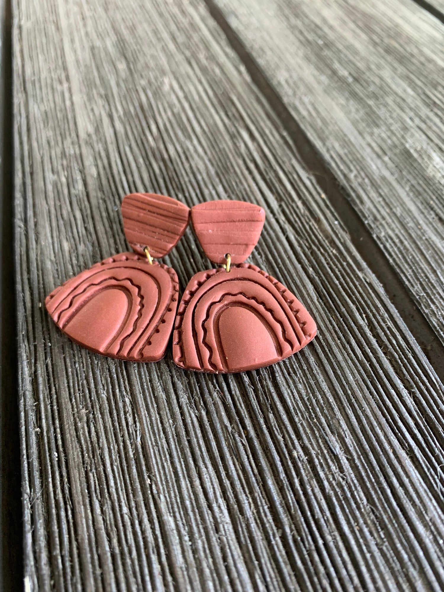 Handcrafted polymer clay earrings with intricate design and 18k gold plated earring posts
