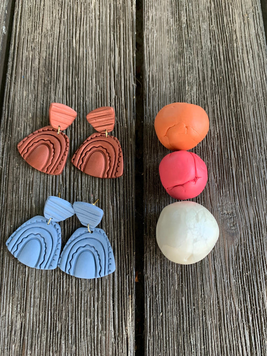 Handcrafted polymer clay earrings with intricate design and 18k gold plated earring posts