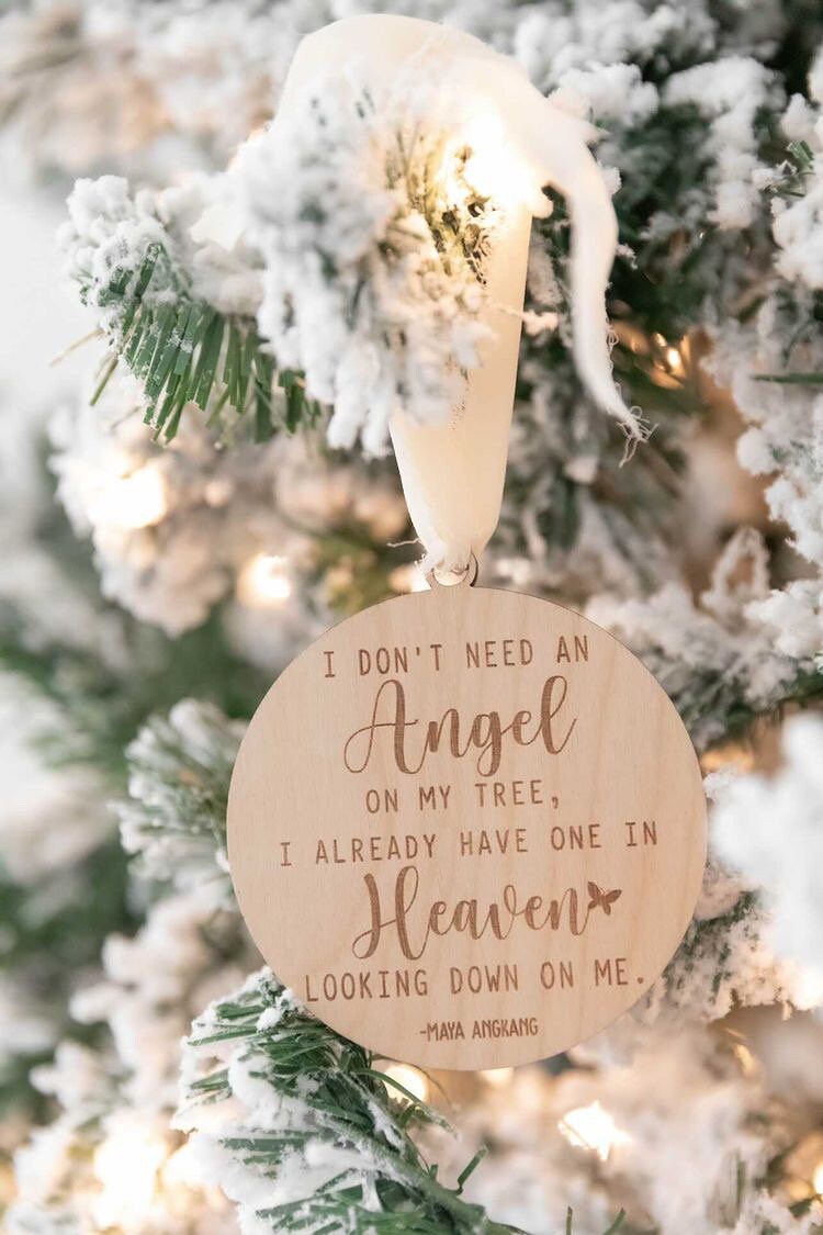 Handcrafted wooden ornament with the quote "I don't need an angel on my tree, I already have one in heaven looking down on me"