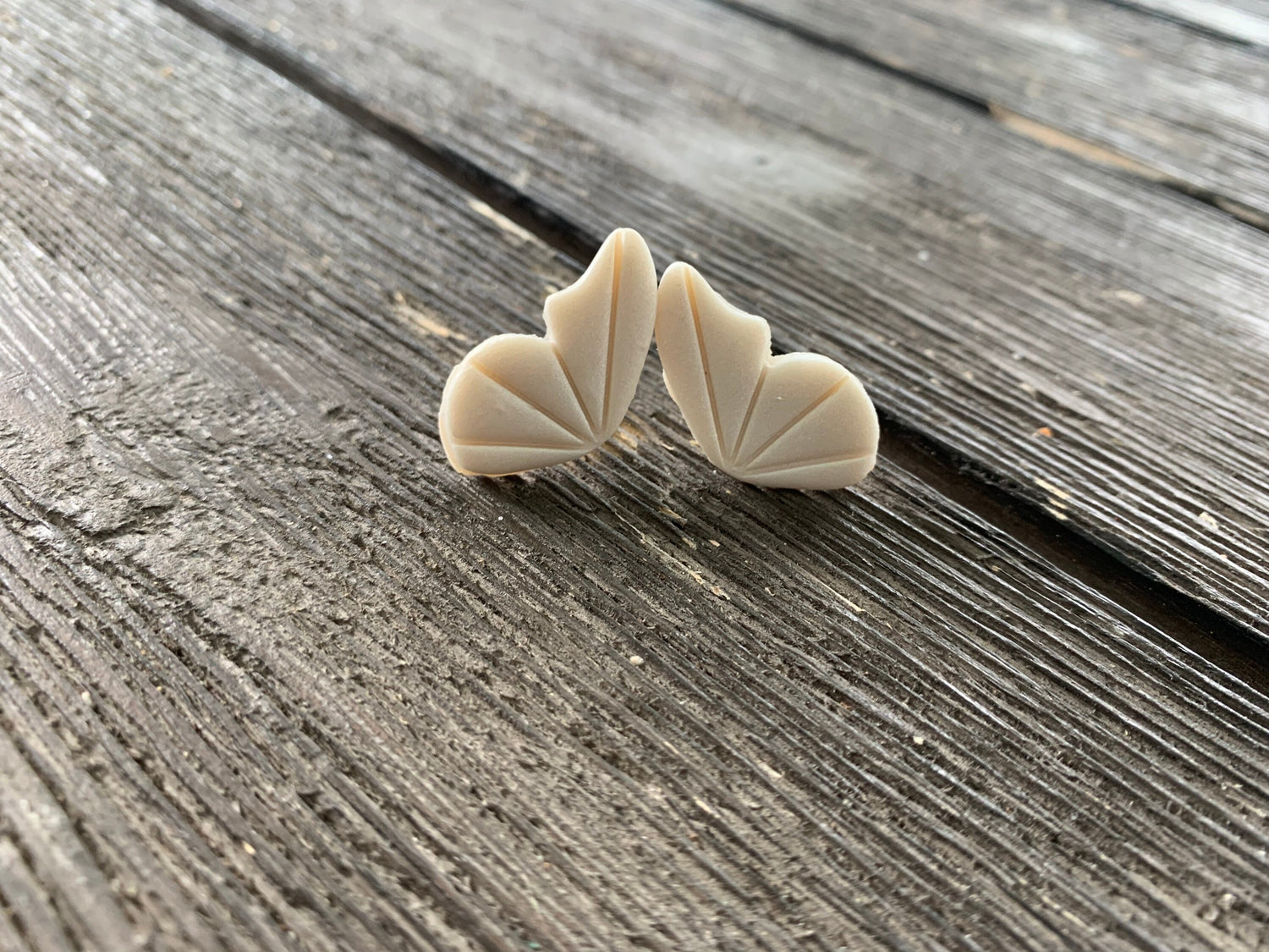 Collection of polymer clay earrings with 18k gold plated earring posts in a range of colors