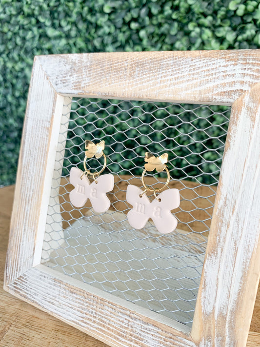 Handcrafted polymer clay earrings with intricate design and 18k gold plated earring posts