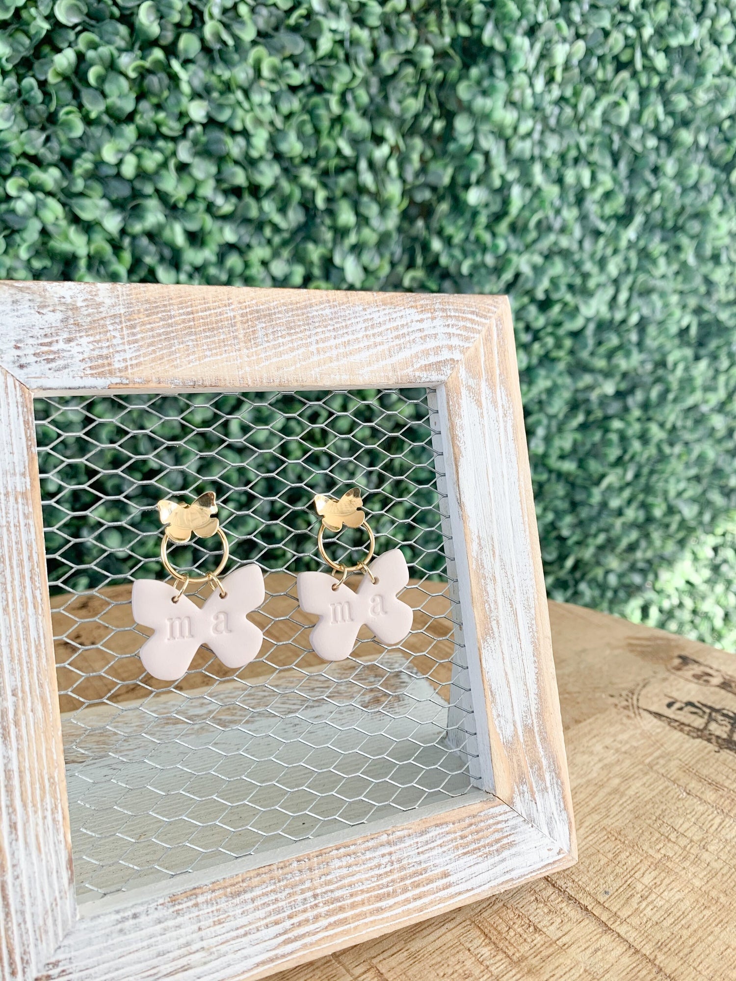 Handcrafted polymer clay earrings with intricate design and 18k gold plated earring posts