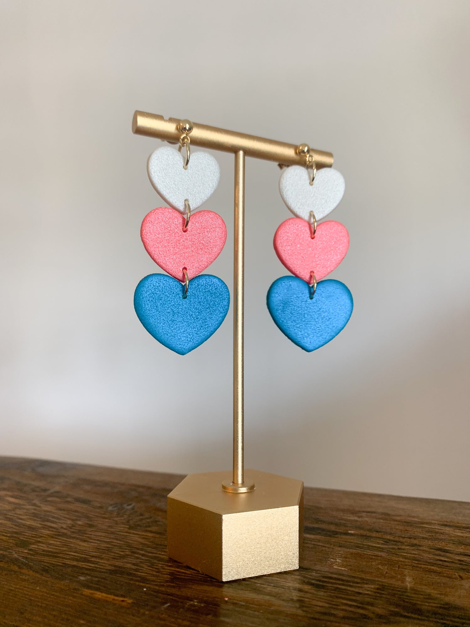 Handcrafted polymer clay earrings with intricate design and 18k gold plated earring posts