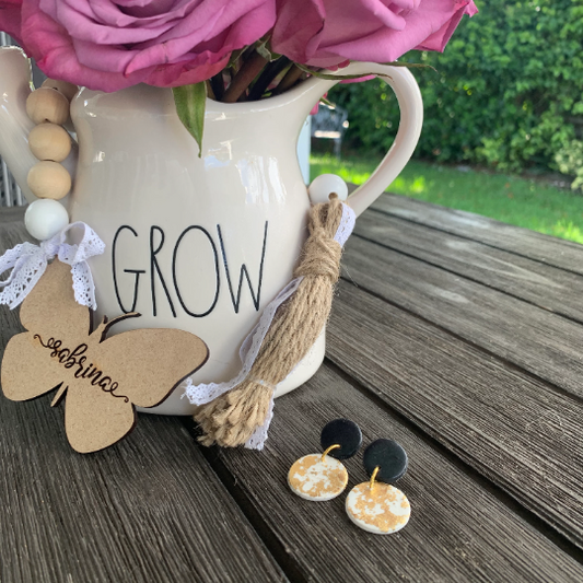 Handcrafted polymer clay earrings with intricate design and 18k gold plated earring posts