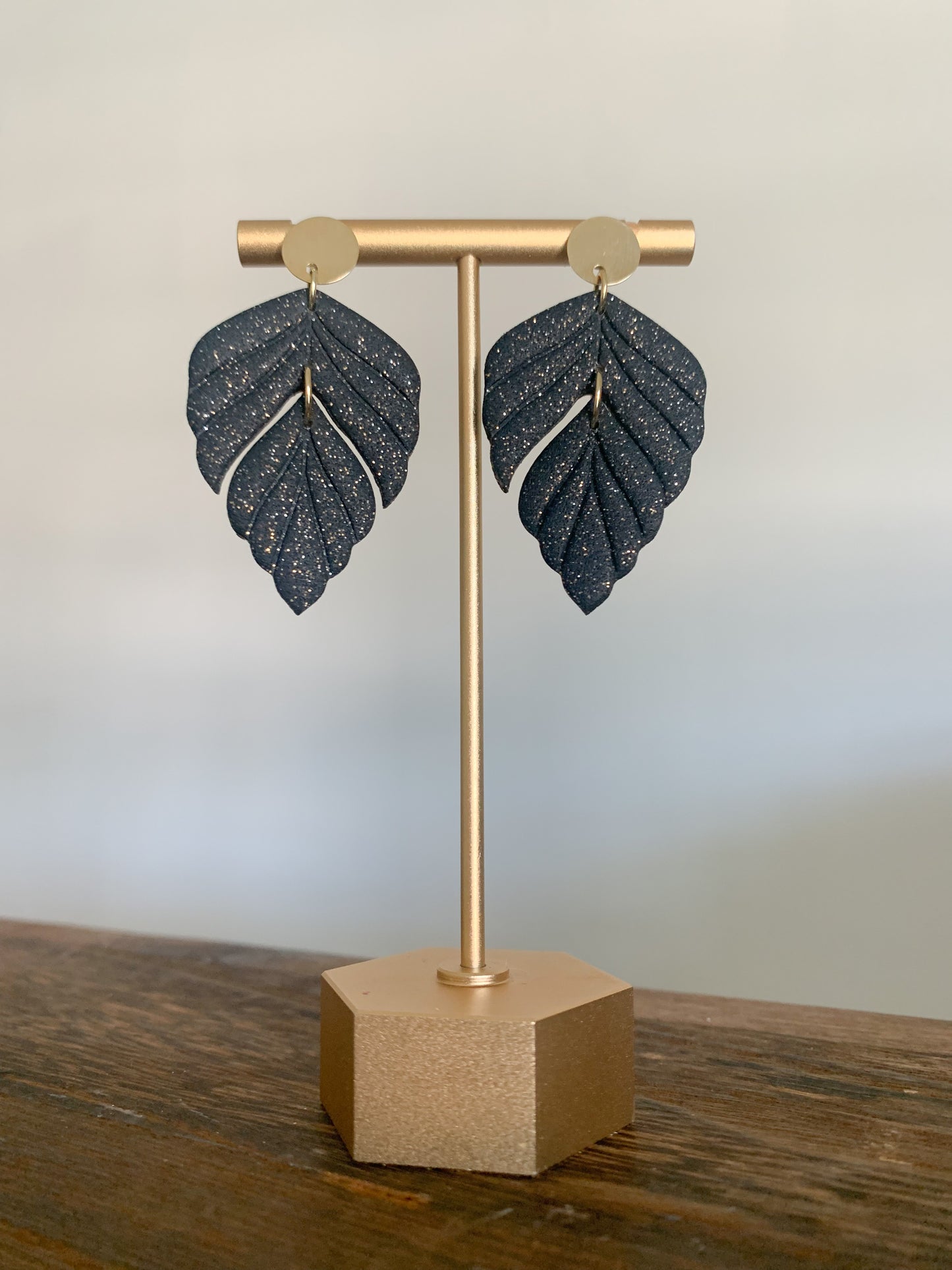 Handcrafted polymer clay earrings with intricate design and 18k gold plated earring posts